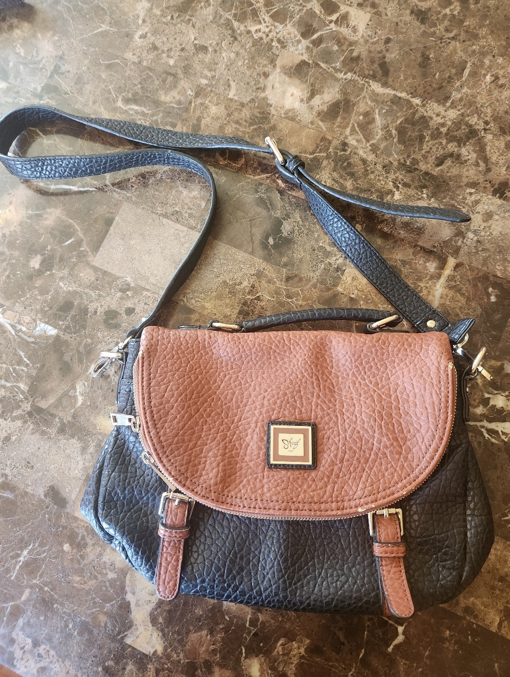 Elegant Black and Brown Leather Handbag